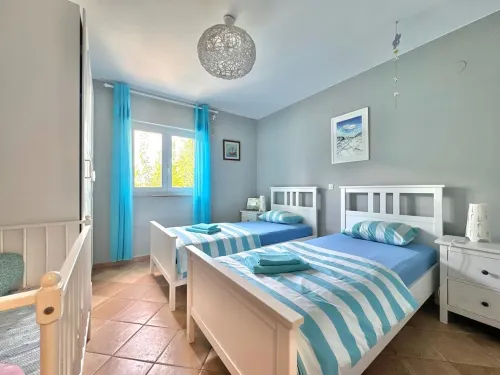 Apartment Didi with private garden, close to the center, family-friendly