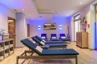 AlpenParks Hotel & Apartment Central Zell am See فنادق في زيل أم سيي