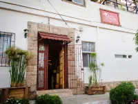 Hostal del Aguila Hotels near Holy Water