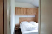 Chalets with a Bathroom, Near a Pond