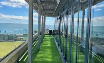 Beachfront Penthouse Apartment with Wrap-Around Balconies and Panoramic Sea Views