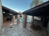 House with swimming pool and barbecue.