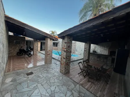 House with swimming pool and barbecue.