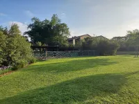 Apartment with Lush green garden and a Pool