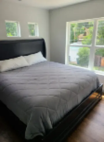 Stay just 5 minutes from downtown in this spacious 1-bedroom retreat.