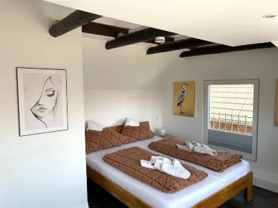 Stylish, romantic top-floor apartment with balcony and that certain something Hotels near Kirche Greetsiel