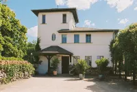 Turmvilla Ground Floor: Terrace with Pergola, Wood-Burning Stove and Water Access