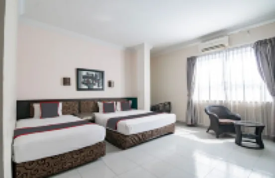 Collection O Senapelan Near Rsud Petala Bumi Formerly de Town Hotel Hotel a 