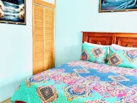 Dawson’s Hideaway Hotels near Paradise Beach