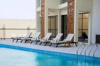 Golden Tulip Muscat The Village - de playa