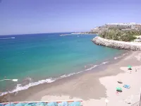 Balcón al atardecer con vistas al mar y acceso a la piscina!
