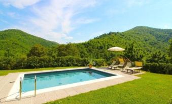 Holiday Home in Val di Chio with Pool