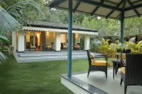 Whistling Woodzs Resort Отели в г. Дандели