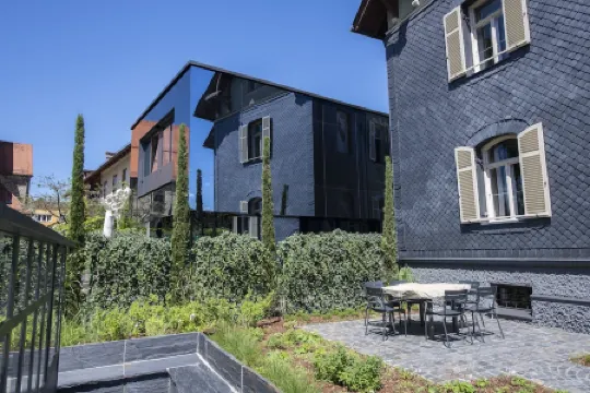 Exklusives Urlaubs-appartement "pfauenauge" Отели в г. Траунштайн