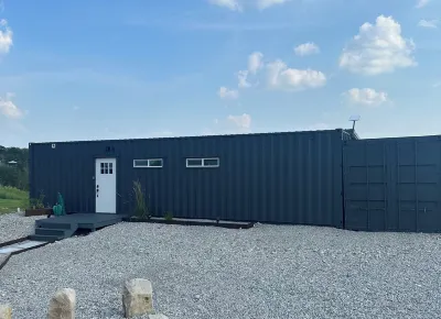 Unique Shipping Container Home with River View near Eureka Springs