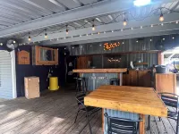 Waterfront house with boathouse, boat launch, outdoor kitchen, fire pit