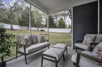 Luxury 4BR Home with Screened Porch & Fenced Yard