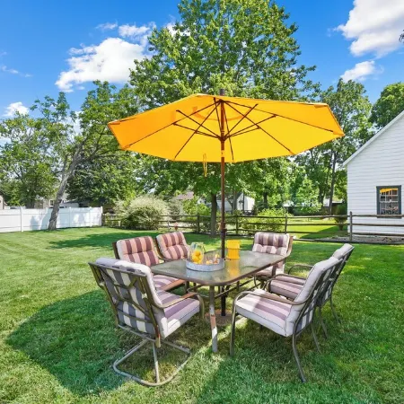 High-end home w/ fireplace, gourmet kitchen, sauna, game rm/ large yard/fire pit