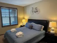 Spacious 5-bedroom, 5-bathroom townhome with WiFi, AC, Priv Hottub, ElecCharging