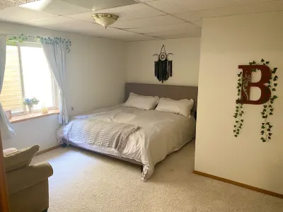 Large basement apartment, private living room, bathroom & kitchenette