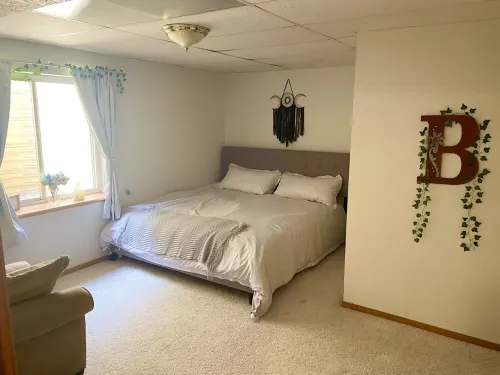 Large basement apartment, private living room, bathroom & kitchenette