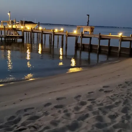 Room on river with sunset views and private beach!