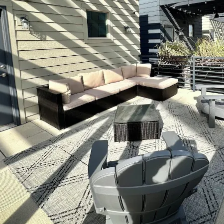 Luxury condo. 2 car garage, rooftop patio. Perfect for work or play!
