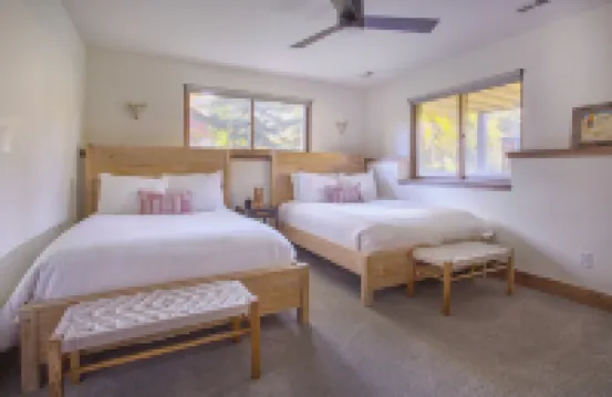 Dreamy home on river, mountain views, steps from town.