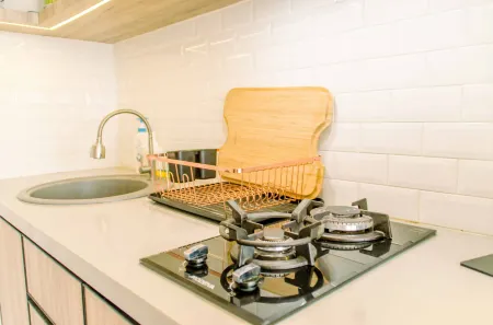 Simple and Cozy Living Studio Room at Poris 88 Apartment