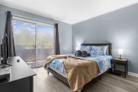 Outdoor Pool and Relaxing Balcony - Charming Coastal Sanctuary Hotels near NMB Nature Trail