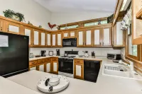 Charming Cabin with Creek and Scenic Deck - Stylish Escape