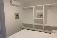 Hosts Br - Apartamentos Funcionais Hoteles cerca de Ohana Garden
