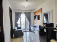 Homey and Comfy 2Br at Vida View Apartment Hotels in Panakkukang