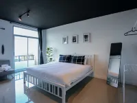 Black Turtle Hotels near Wat Si Sunthon