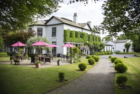 Statham Lodge Hotel Отели в г. Вулстон