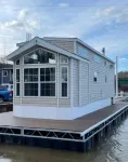 Waterfront Glamping Escape  Cozy Floating Cottages on the Peaceful Beaver River Hotels near The Belvedere at Beaver Station