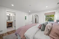 Custom Home with Lake Views + Cozy Fireplace