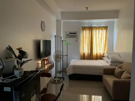 Furnished Studio @Green2 Dasma Pool+Wi-Fi+Netflix