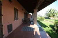 Apartments with pool and garden a short distance from the beach.