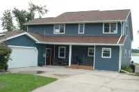 New owners, fresh remodel - Lakehouse with 100' of sandy frontage on White Lake!
