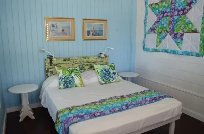 Step from your porch onto the soft white sand & crystal clear water. Hotel a 