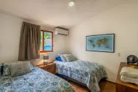 Your own Private Oasis with Heated Saltwater Pool! 5 minute walk to beach/town Hotels near Koko Boutique