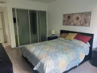 Beach Condo 3 mins walking distance from the beach, Amazing Pool 2BR Gated Comm.