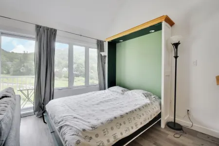 Condo à Stoneham Directement Dans les Pistes!! Ski in / ski out en Pleine Nature Отели рядом с достопримечательностью «Nordique spa Stoneham»