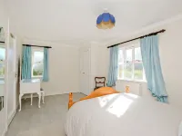 Corrennie School Cottage Hotels in 