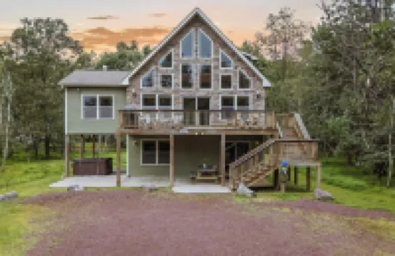 Sleeps 18 • Lake Access Game Room Close to Skiing Otter Banks by AvantStay