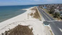 Beachfront - unbeatable location - steps to beach & shops - sunsets from porch!