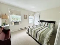 Spacious 5Bdrm Home- Saltwater Pool, WiFi, AC, Private Beach Parking Pass