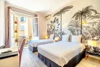 Hotel les Palmiers فنادق في سانت ماكسيم
