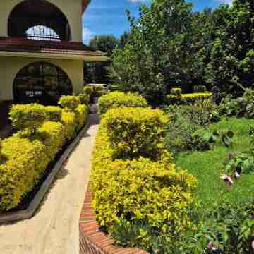 A farmhouse within the Tea farm estates Hotel Exterior